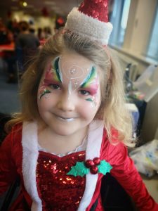 Christmas fairy face painting at a party in Bristol.