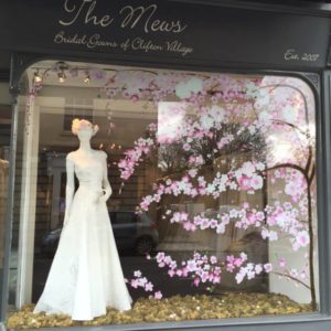 Cherry blossom window display painting Bristol.