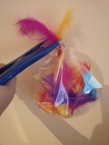 stuffing bobo balloon with feathers