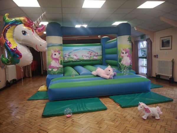 Unicorn theme bouncy castle gloucester