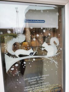 Christmas shop window painting displays gloucestershire