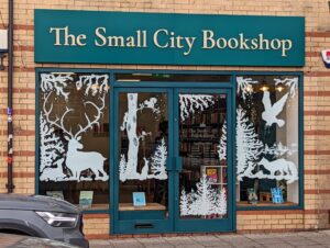 bookshop christmas window display painting artist Bristol