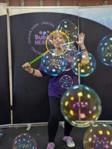 blowing bubbles kids party entertainer Gloucestershire