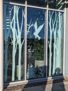 Christmas window ideas hand painted white winter scene Birstol