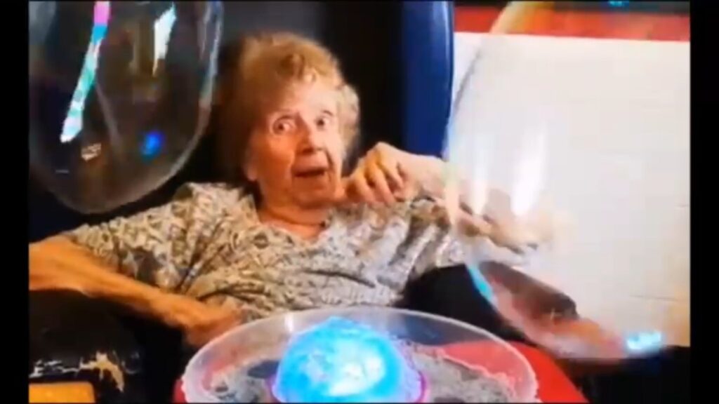 A bubble show for residents in a care home lounge