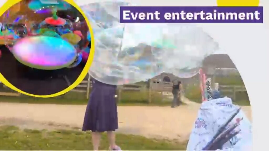 Children enjoying bubbles, face painting and balloons at a party